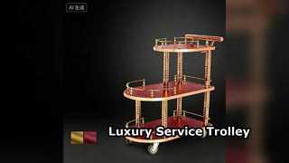Элегантная золотая сервировочная тележка